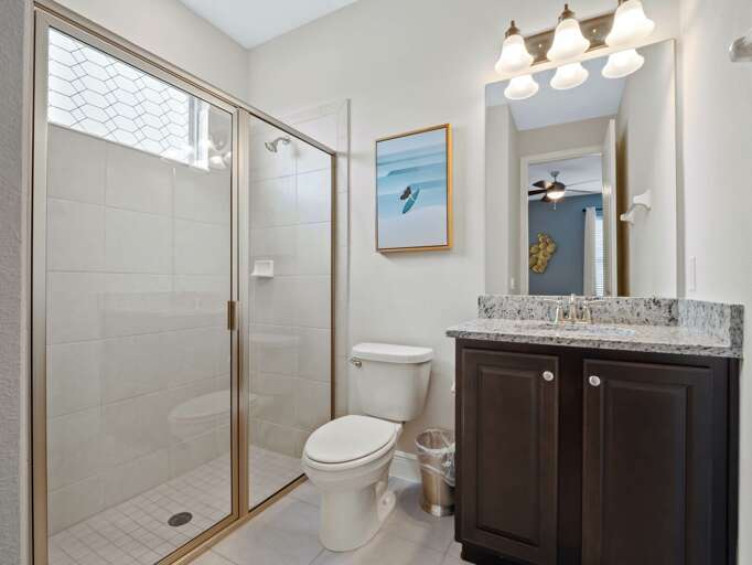 Bathroom with glass enclosed shower