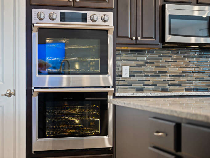 Kitchen area with stainless steel appliances and spacious island