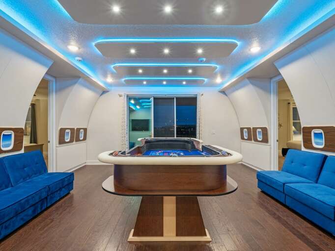 Private Jet themed game room with craps table