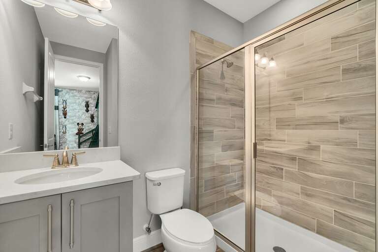 Bathroom with glass enclosed shower