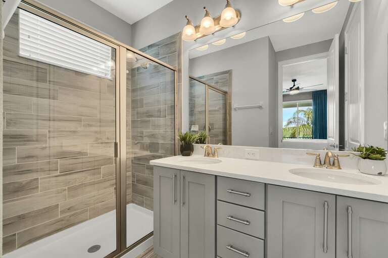 Bathroom with glass enclosed shower