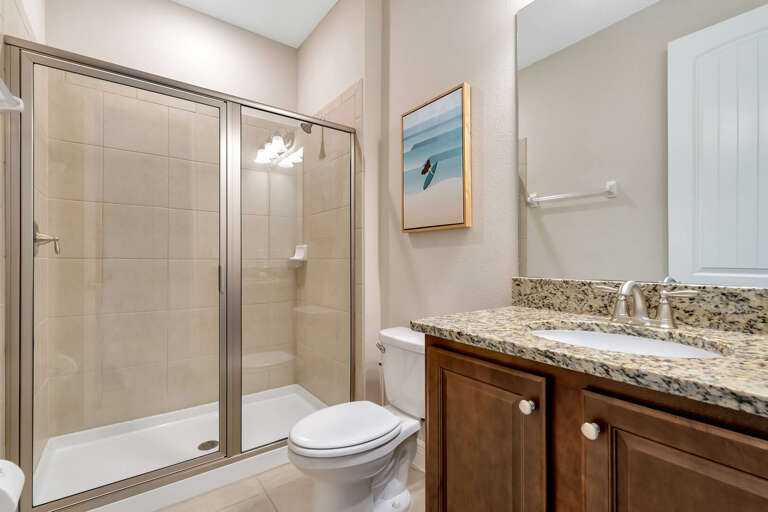 Bathroom with glass enclosed shower