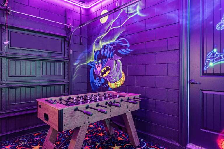 Game Room With Foosball Table And Mural