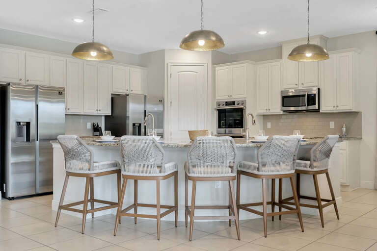 Kitchen area with stainless steel appliances and spacious island