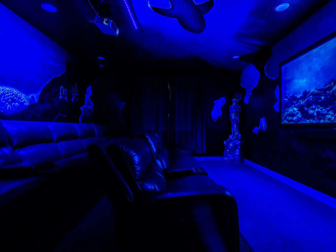 Under-the-sea themed theater with tiered seating