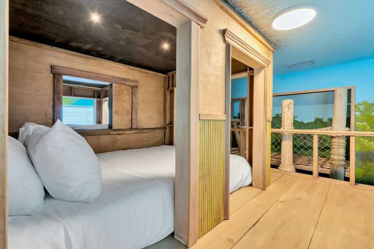 Treehouse themed bedroom with dual Full beds