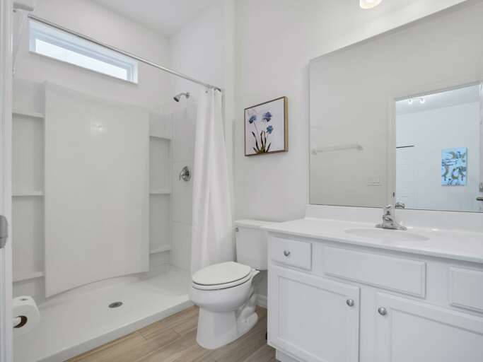 Bathroom with bathtub and shower combo