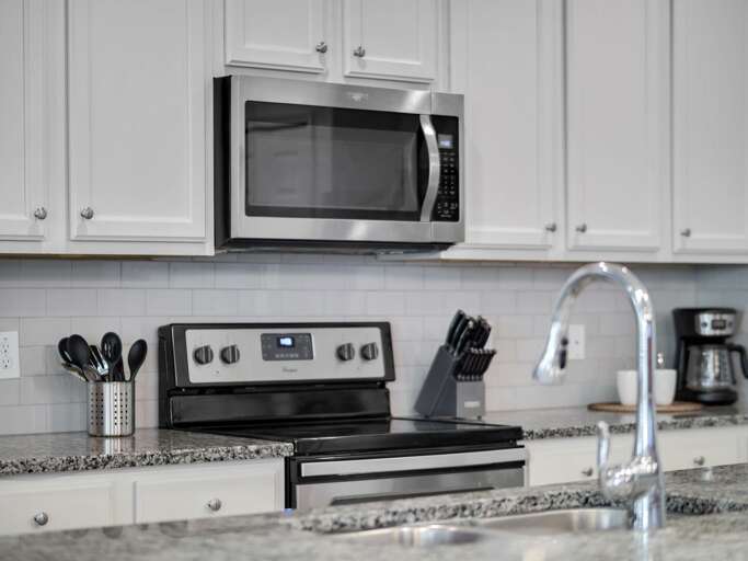 Kitchen area with stainless steel appliances