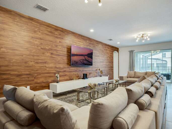 Living area with comfy sectional sofa and flat screen TV