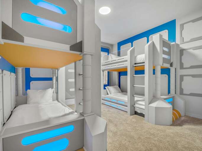 Star Wars themed bedroom with dual Twin over Twin bunk beds
