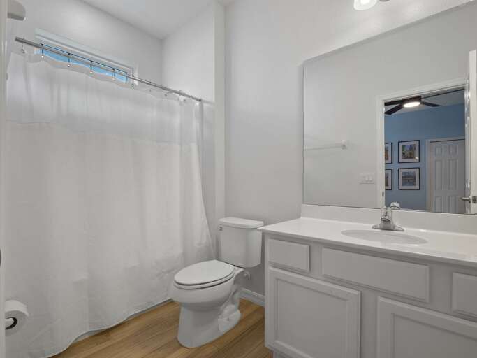 Bathroom with bathtub and shower combo