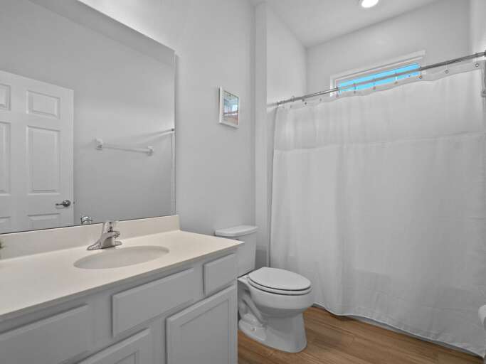 Bathroom with bathtub and shower combo