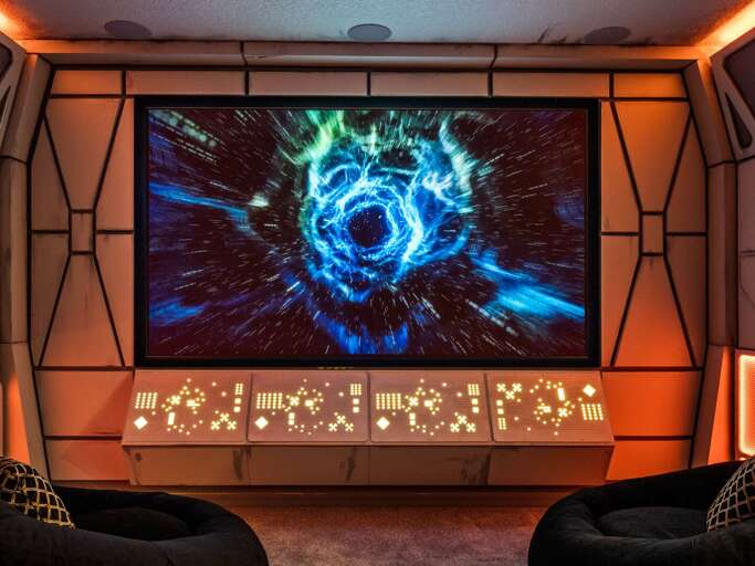 Deep space themed theater with tiered seating
