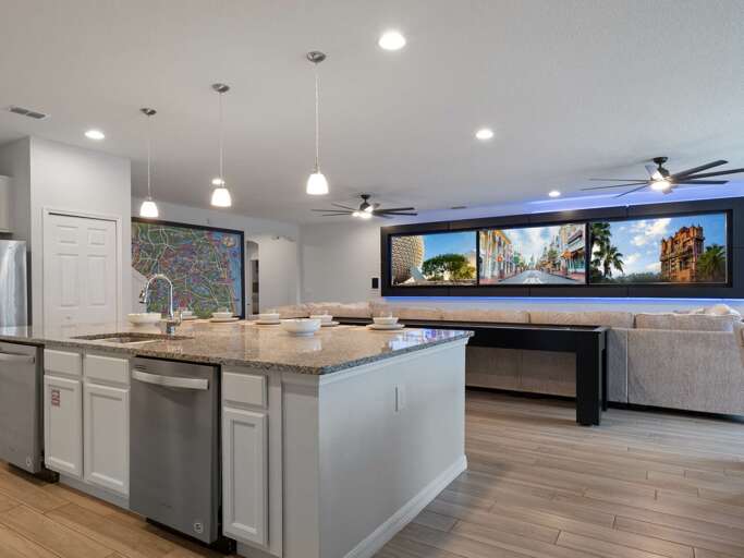 Kitchen area with stainless steel appliances and spacious island