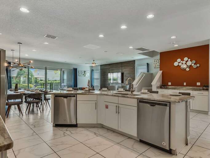 Kitchen area with stainless steel appliances and spacious island