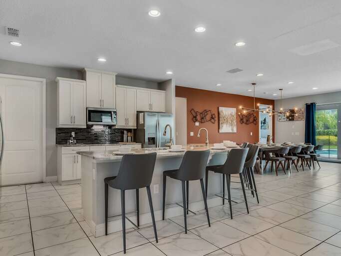 Kitchen area with stainless steel appliances and spacious island