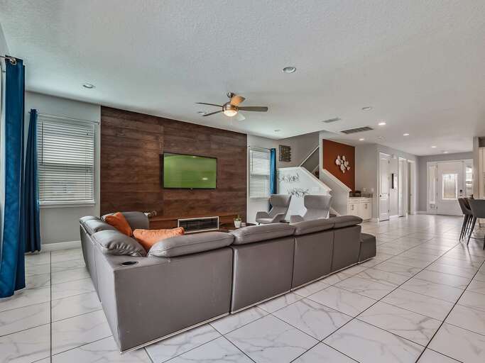 Living area with comfy sectional sofa and flat screen TV