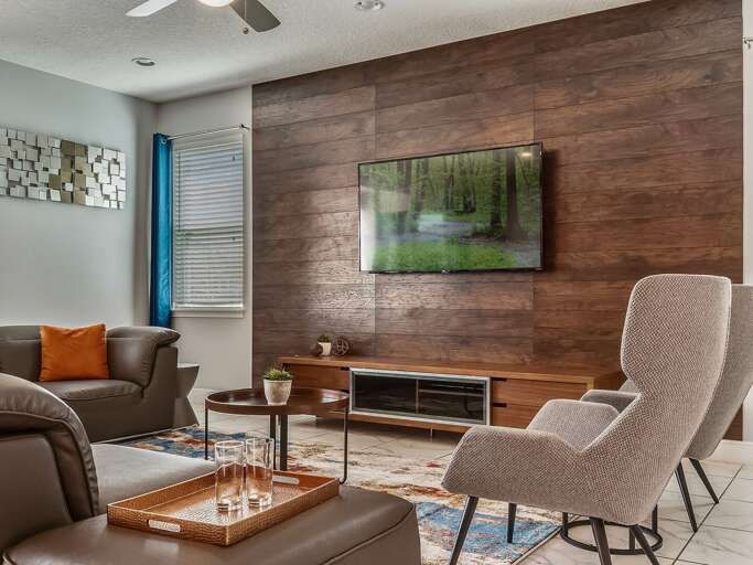 Living area with comfy sectional sofa and flat screen TV