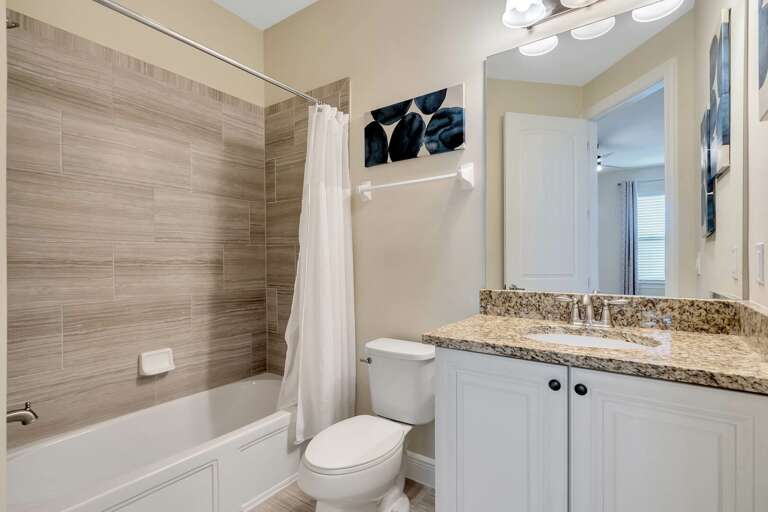 Bathroom with bathtub and shower combo Bathroom with bathtub and shower combo