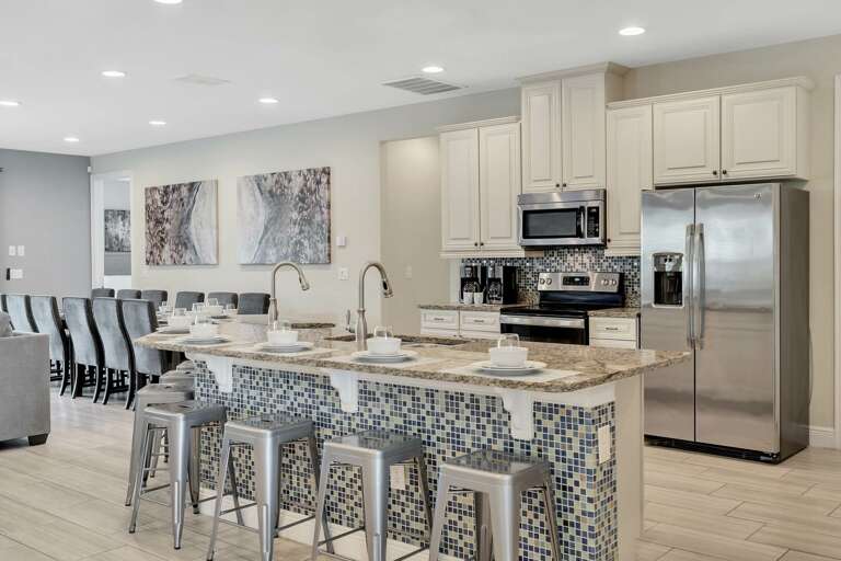 Kitchen area with stainless steel appliances and spacious island Kitchen area with stainless steel appliances and spacious island