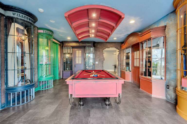 Wizard's Alley themed game room with pool table Wizard's Alley themed game room with pool table