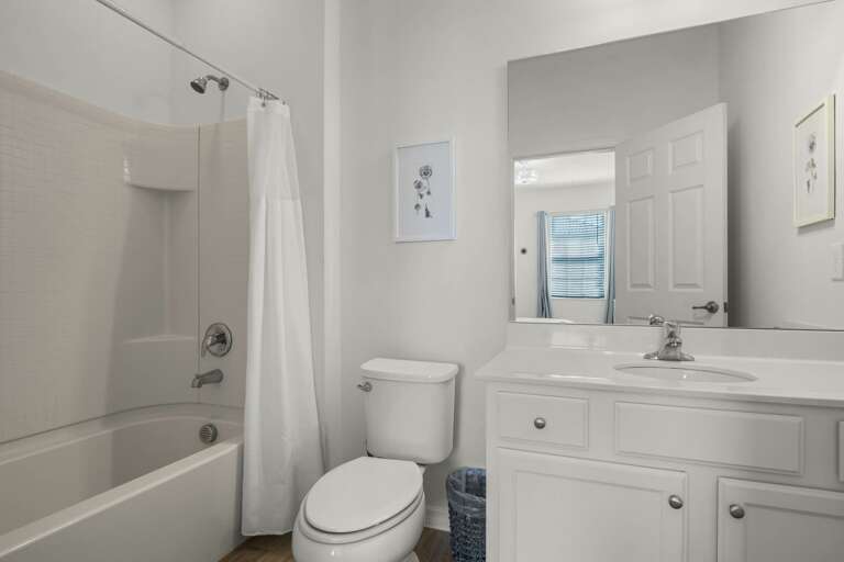 Bathroom with bathtub and shower combo Bathroom with bathtub and shower combo