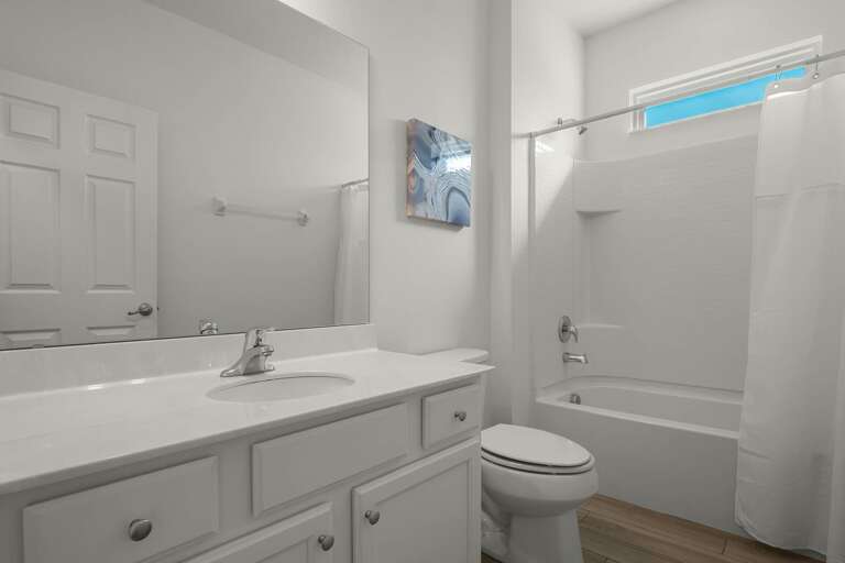 Bathroom with bathtub and shower combo Bathroom with bathtub and shower combo