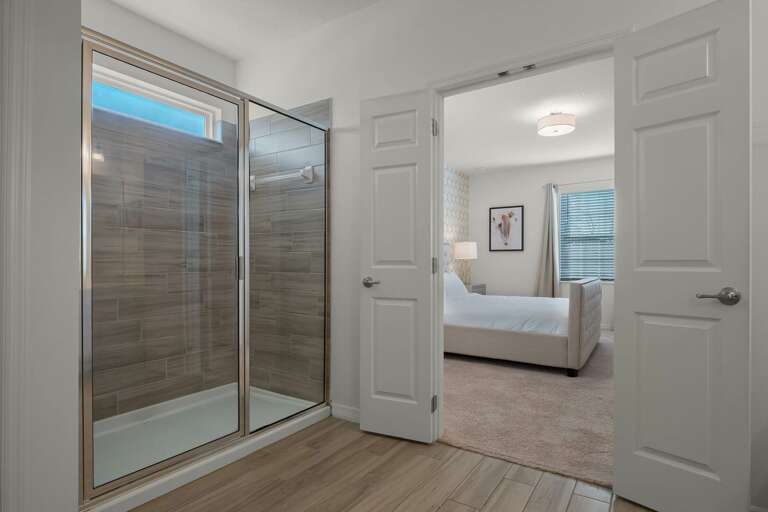 Bathroom with glass enclosed shower Bathroom with glass enclosed shower