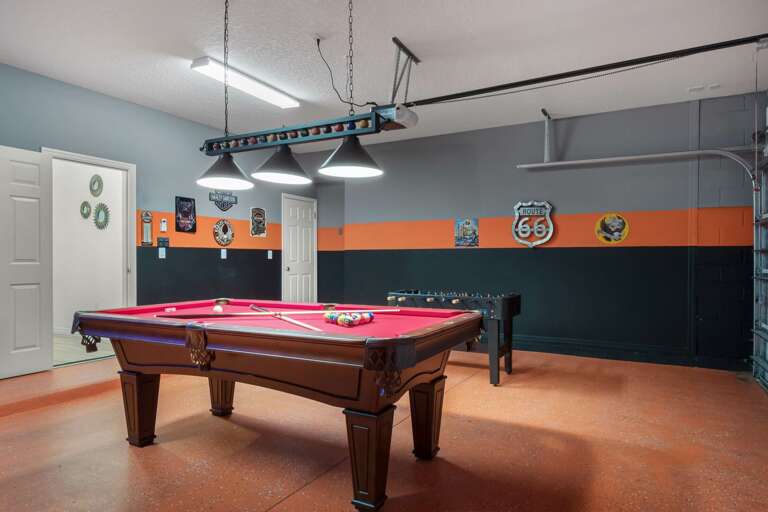 Garage converted to game room with pool table and foosball Garage converted to game room with pool table and foosball