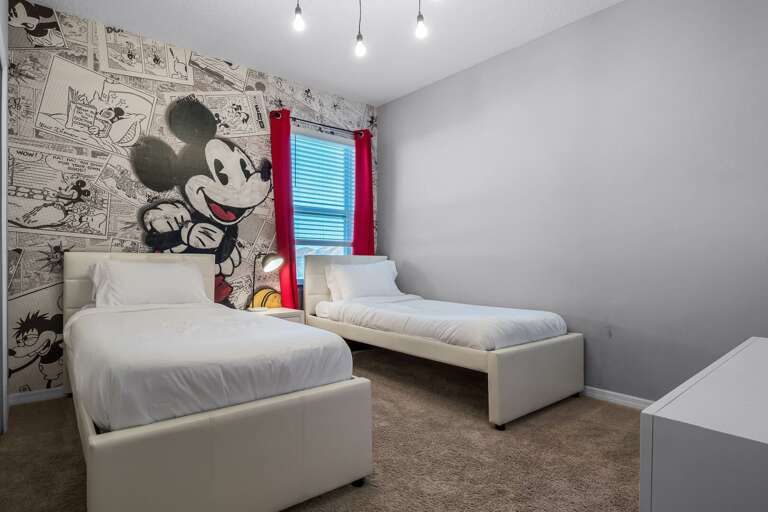Mickey Mouse themed bedroom with Dual Twin beds Mickey Mouse themed bedroom with Dual Twin beds