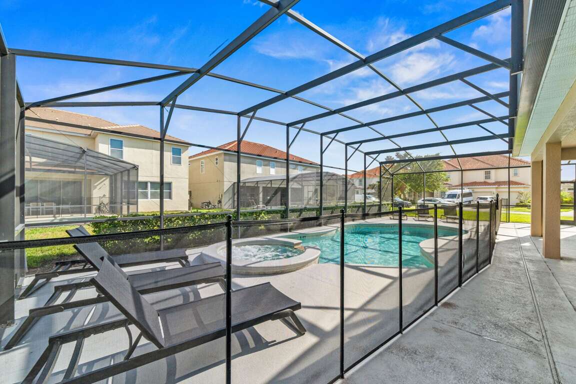 - Private screened pool with hot tub for relaxing sunny days  
- Family-friendly Orlando vacation rental with outdoor seating  
- Refreshing poolside escape for groups and family gatherings - Private screened pool with hot tub for relaxing sunny days  
- Family-friendly Orlando vacation rental with outdoor seating  
- Refreshing poolside escape for groups and family gatherings