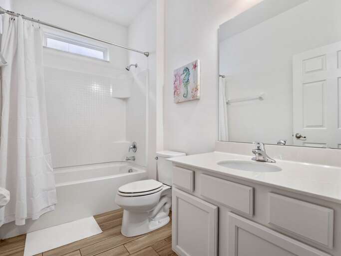 Bathroom with bath and shower combo