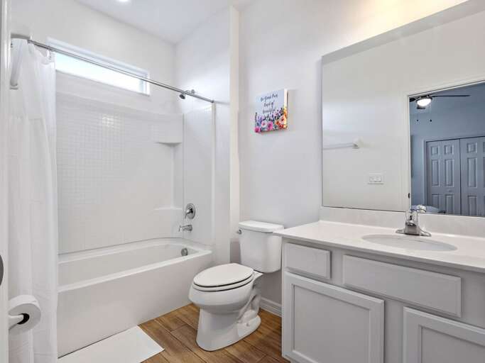 Bathroom with bath and shower combo