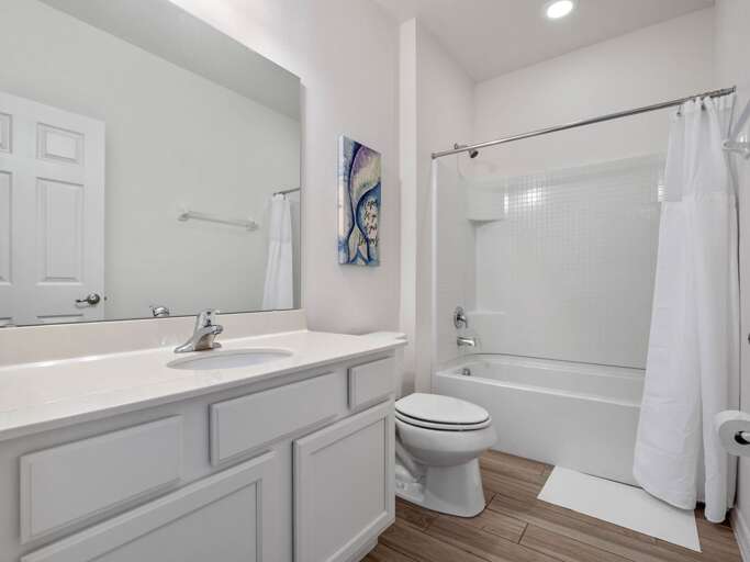 Bathroom with bath and shower combo