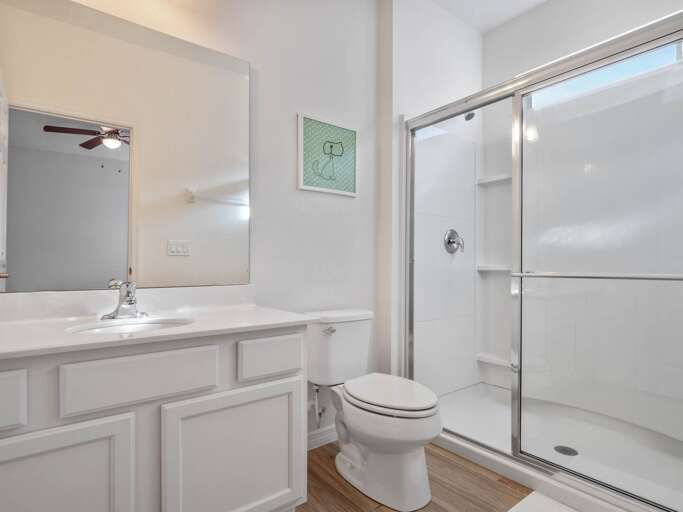 Bathroom with glass enclosed shower