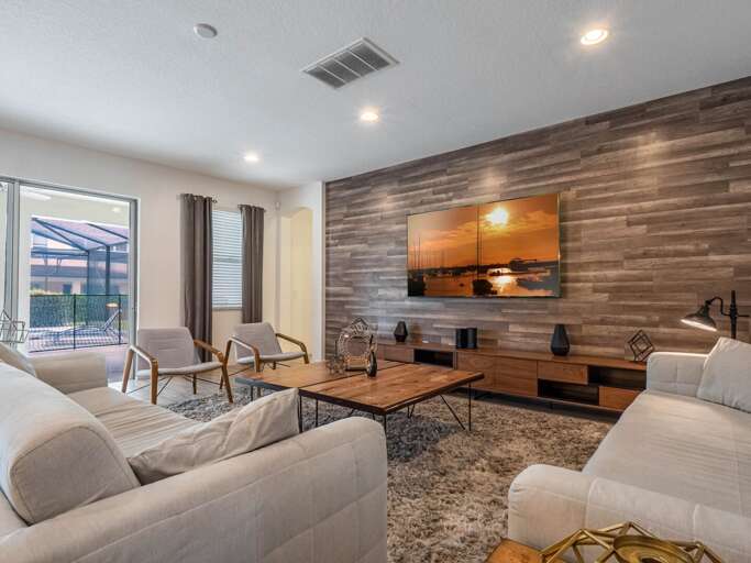 Living area with contemporary furniture and flat screen TV