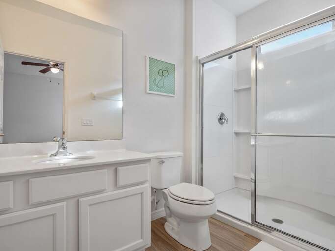 Bathroom with glass enclosed shower