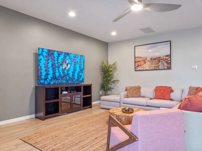 Living area with contemporary furniture and flat screen TV