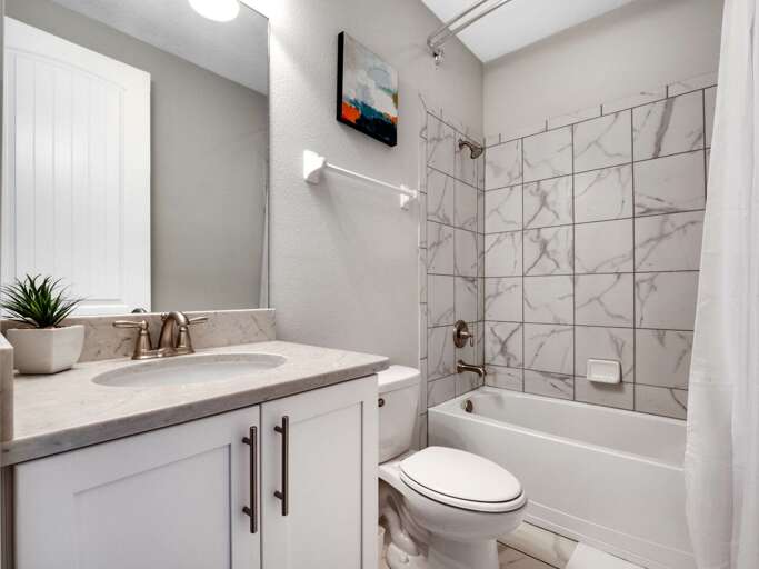 Bathroom with bathtub and shower combo Bathroom with bathtub and shower combo