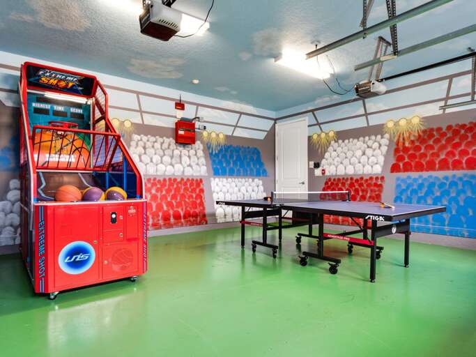 Game room with basketball arcade and ping pong table