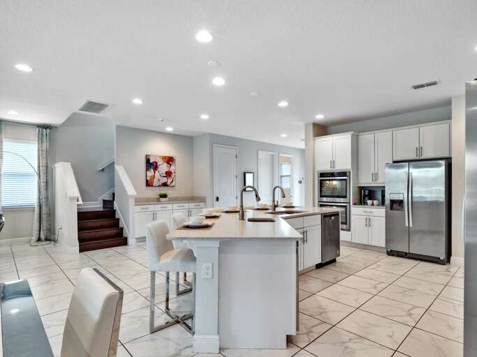 Kitchen area with stainless steel appliances and spacious island