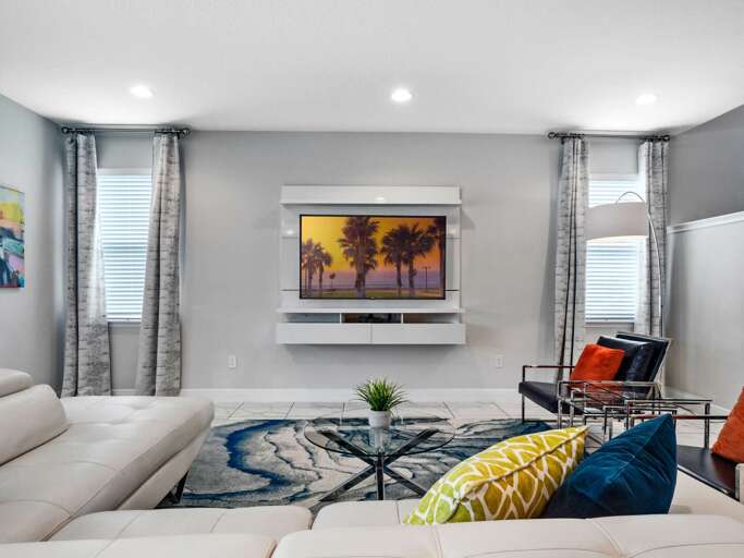Living area with contemporary furniture and flat screen TV Living area with contemporary furniture and flat screen TV