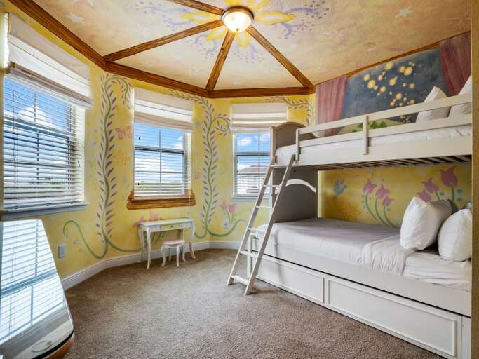 Princess themed bedroom with Twin over Full bunk beds