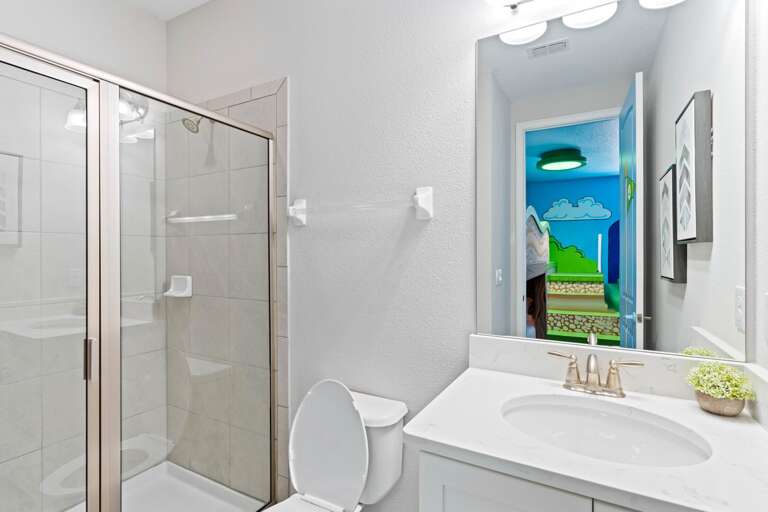 Bathroom with glass enclosed shower