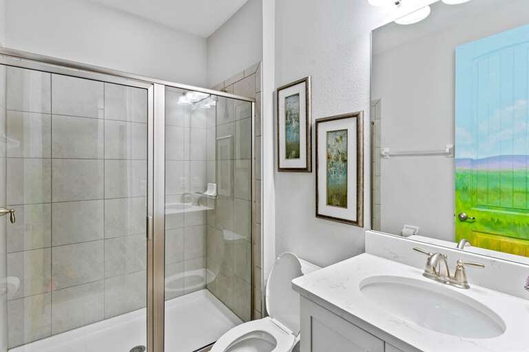 Bathroom with glass enclosed shower