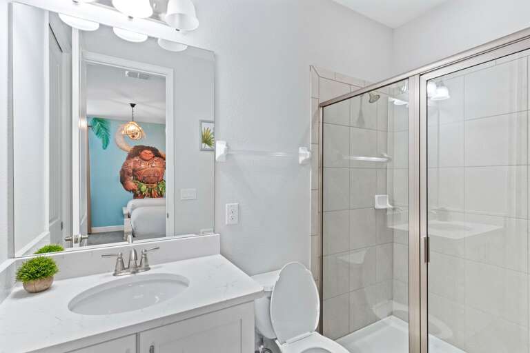 Bathroom with glass enclosed shower