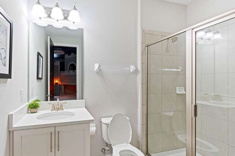 Bathroom with glass enclosed shower