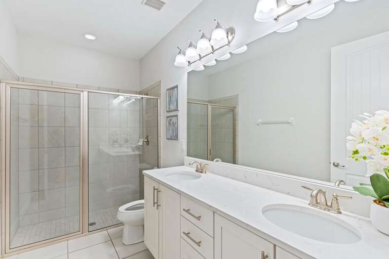 Bathroom with glass enclosed shower