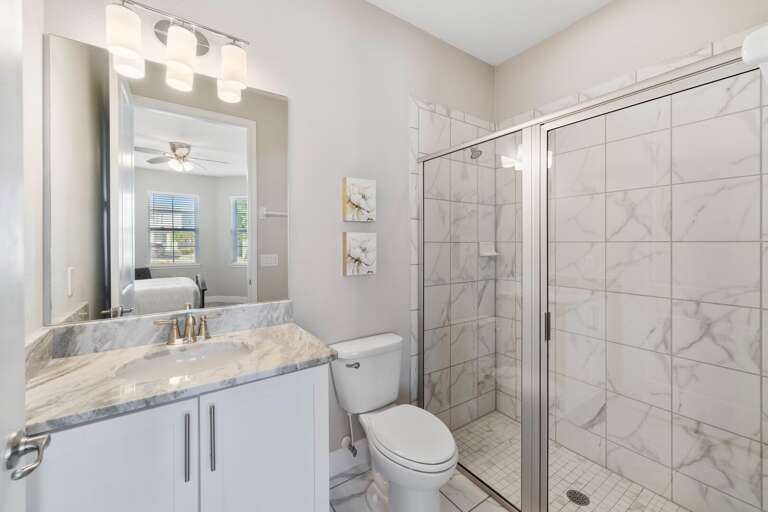 Bathroom with glass enclosed shower