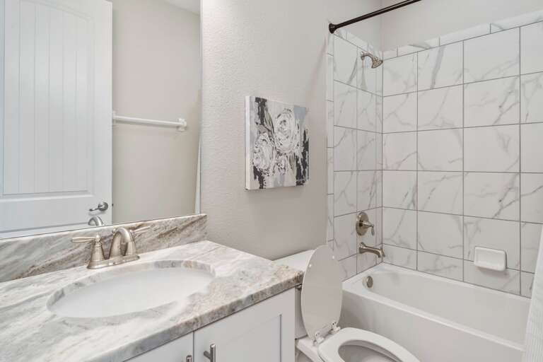Bathroom with shower and tub combo